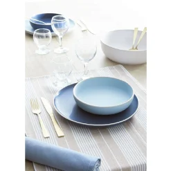 Assiette plate en faïence blanc avec liseré crème