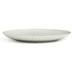 Assiette plate en porcelaine décor rayures soleil